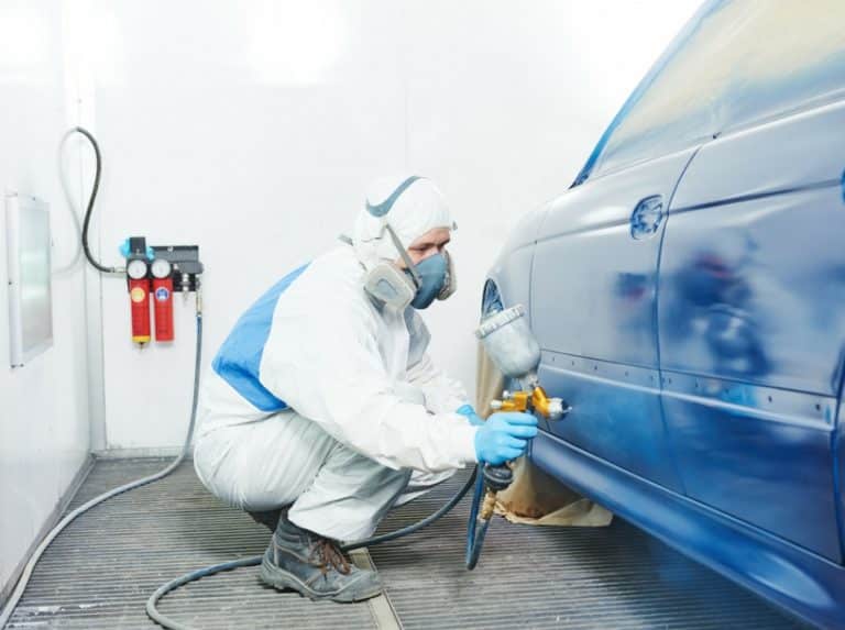Low Voc Paint What Are Vocs And Will They Kill Me Yes Worker With Paint Respirator To Filter Voc