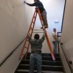 man holding a ladder