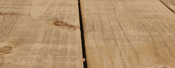 Brown pressure treated wood just needs a light washing Brown pressure treated wood just needs a light washing