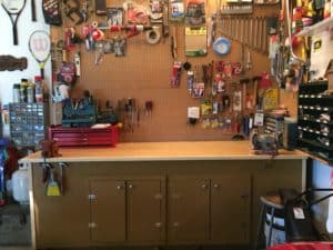 assorted old and new tools in workshop