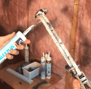 How to load caulk gun: showing the poker