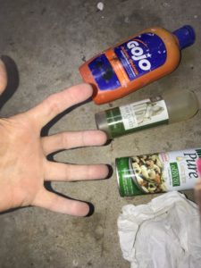The fingers point at the paint remover used spray painted fingers testing paint removers