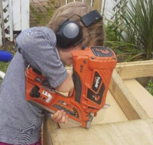 Paslode the best framing nailer is used by a small girl child uses a paslode framing nailer