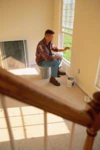 Man Painting Trim