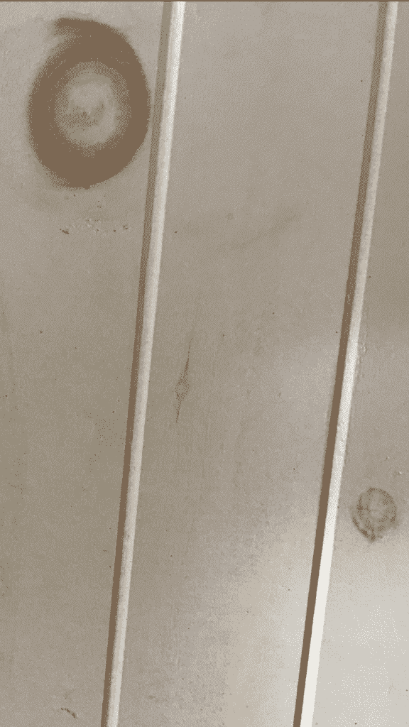 When painting stained wood knots bleed through if wrong prmer is used Brad the Painter