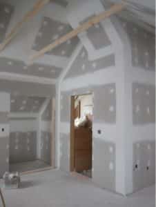 Drywall sanding a room