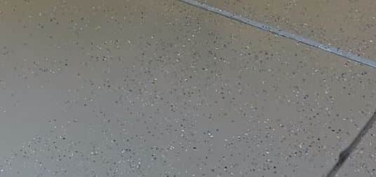 Concrete paint on garage floor with color flakes