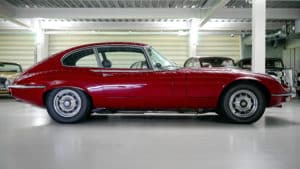 Red Jaguar on Garage Floor Painted White