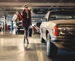 woman walking on garage floor with new coating