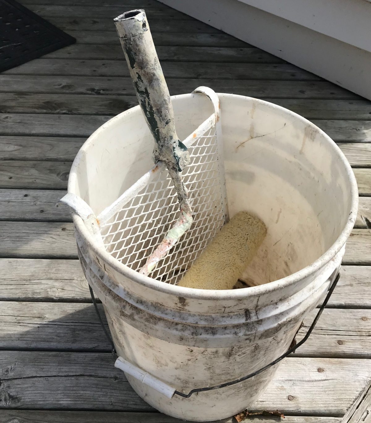 Paint roller bucket and screen set up Brad the Painter