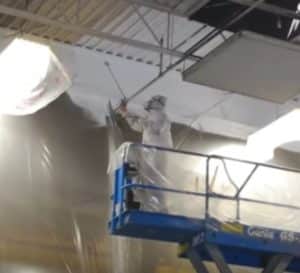 commercial painting with sprayer on lift commercial paint sprayer on lift