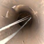 Hold both ends of the string and pull to turn corner