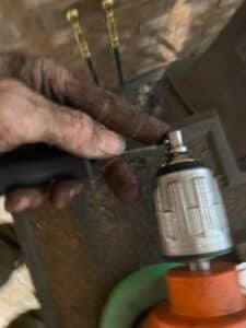 You have to push the ball to release the rod and the tool they provide is not as good as my custom pusher
