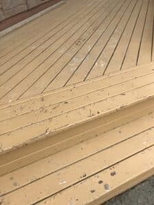 Deck damaged by snow shovel in winter